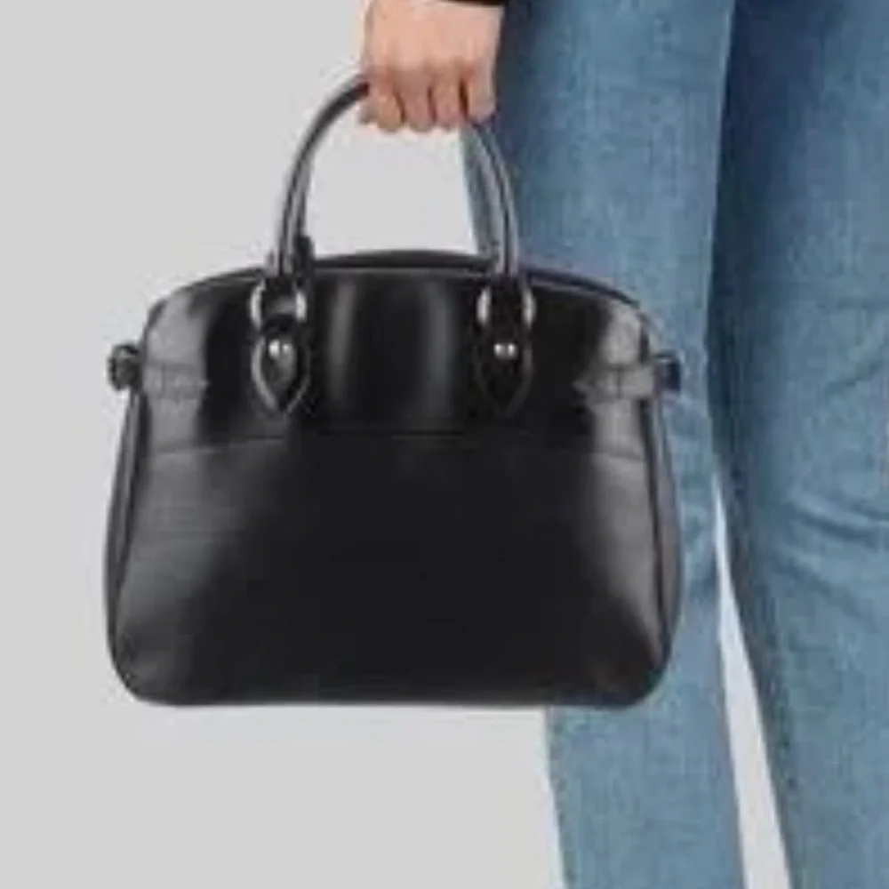Louis Vuitton satchel owned